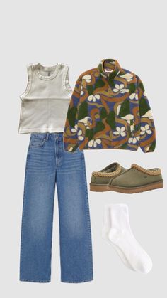 a pair of jeans, sweater and shoes are arranged on a white background with an image of the same outfit