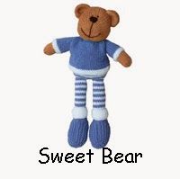 a stuffed teddy bear wearing blue and white striped socks with the words sweet bear on it