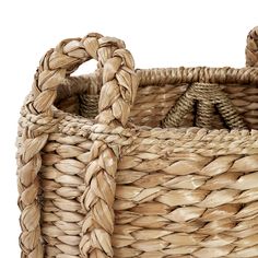 a large woven basket with two handles