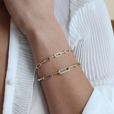 Your outstanding taste will speak for itself when you wear this Paper Clip 14K Gold Micro Pave Link Chain Bracelet. Intricately handmade, this 14K gold piece looks just as wonderful alone as it does as part of a curated stack. Wear yours with a pretty white dress and a flower headband to hint at the design throughout your look. Item is MADE TO ORDER & it may take 2-8 Weeks to Ship. Although our jewelers are timely in creating your item and most items ship sooner, please contact us if you need yo Diamond Link Chain Bracelet, Braclets Gold, Award Winning Jewelry, 18k Gold Bracelet, Link Chain Bracelet, 14k Gold Necklace, Initial Jewelry, Solid Gold Jewelry, Yellow Gold Chain