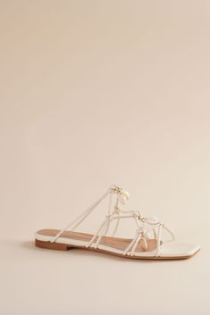 The Shoreline Flat Sandal in Ivory with knotted leather and embellished with shells for those summer vacations on the beach. Brother Vellies, Navy Flats, Digital Closet, Summer Vacations, Flat Sandals, Summer Vacation, The Beach, Shells, Sandals