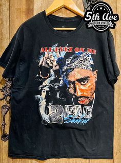 #tupac #2pac #rapper #hiphop #politicalhiphop #westcoasthiphop #tee #tshirt #streetwear #vintagereprint #vintaget #y2k #shopvintage #thrift #thriftshop #90sstyle #vintageclothing #vintaget #bootleg Vintage T-shirt With Sublimation Print For Streetwear, Vintage Sublimation Print T-shirt For Streetwear, Vintage T-shirt With Front Print For Streetwear, Vintage Streetwear T-shirt With Screen Print, Vintage T-shirt With Screen Print For Streetwear, Vintage Acid Wash T-shirt For Streetwear, Unisex Vintage T-shirt With Graphic Print, Vintage Acid Wash Top With Sublimation Print, Vintage Cotton T-shirt With Sublimation Print