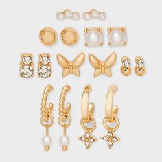 Add a variety of styles to your earrings collection with the 8-Piece Pearl Stud Hoop Butterfly Flower Earring Set from A New Day™. This eight-piece earring set includes both stud and hoop earrings adorned with faux pearls and stones for stunning style. With a nickel-free metal construction, these gold-tone earrings suit sensitive skin, and they offer a secure fit with post-back closures. A New Day™: Style that goes wherever you do. Flower Earring, Stunning Style, Butterfly Flower, Butterfly Flowers, Girls Earrings, Earrings Collection, Pearl Studs, Metal Construction, A New Day