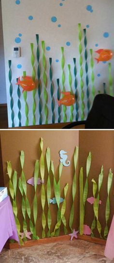 two pictures with paper fish and seaweed on the wall