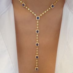 Crystal Cherie Necklace (Blue) – Love Stylize Gold Diamond Jeweled Necklace, Gold Cubic Zirconia Drop Necklace, Gold Diamond Necklace With Jeweled Detail, Gold Crystal Lariat Necklace, Gold Jeweled Dangle Necklaces, Gold Crystal Drop Necklace, Elegant Gold Crystal Drop Necklace, Elegant Gold Jeweled Crystal Necklace, Gold Dangle Rhinestone Necklace