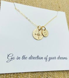 "Graduation Necklace Necklace is all 14k gold filled and customized with the letter of your choice. This is a hand stamped 14k gold filled compass necklace with a 1/2\" 18g 14k gold filled disc with a compass symbol with hammered edges  and an 8mm 14k gold filled disc with a stamped initial. Comes with a 18\" gold filled  cable chain. Please provide the following at checkout in message to seller box: -Initial you  want stamped Each letter has been individually hand stamped. Because of this, the lettering may have slight variations in the spacing, depth of the impression and the alignment. This is the nature of hand stamped jewelry and part of its charm. Back of disc can't be stamped. To check out more personalized items from our shop please click here https://www.etsy.com/shop/UniquelyImpr Gold Inspirational Hand Stamped Charm Necklace, Inspirational Gold Hand Stamped Charm Necklace, Adjustable Hand Stamped Gold Charm Necklaces, Adjustable Gold Hand Stamped Charm Necklaces, Hand Stamped Gold Necklace For Best Friend, Hand Stamped Gold Jewelry For Best Friend, Everyday Gold Jewelry With Compass Design, Compass Symbol, New Bern