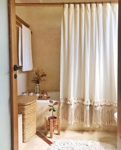 a bath room with a tub and a rug