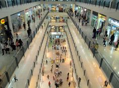 an overhead view of people shopping in a mall