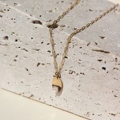 DescriptionThe Olivia Necklace features: Hypoallergenic, waterproof, and nickel free Simple and versatile Minimalistic look Made in the USA Size14" chain, pendant measures 0.8". Material14k gold fill About Token JewelryModern + minimal jewelry with a timeless feel, founded in 2005 by Sarah Willger. Each piece of Token Jewelry is handmade from start to finish, using sterling silver, 14k yellow and rose gold fill and natural gemstones. Sarah draws inspiration for her designs through the exploratio Gold Modern Charm Necklace For Everyday, Modern Gold Charm Necklace For Everyday, Minimalist 14k Gold Teardrop Pendant Jewelry, Minimalist Gold Plated Oval Pendant Charm Necklace, Everyday Tarnish-resistant Recycled Gold Charm Necklace, Gold Chain Necklace With Oval Pendant For Everyday, Minimalist 14k Gold Teardrop Pendant Necklace, Minimalist 14k Gold Pendant Chain Necklace, Everyday Tarnish Resistant Teardrop Pendant Necklace