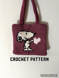 a crocheted bag with a cartoon character on it hanging from a hook in the wall