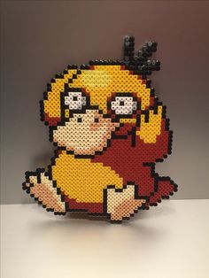 a pixellated image of a cartoon character made out of legos on a table