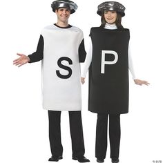 two people dressed in costumes standing next to each other, one wearing a black and white shirt with the letter p on it