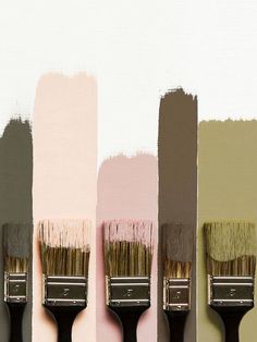 three paint brushes with different colors on them