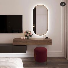 a bedroom with a large mirror on the wall