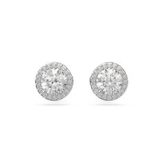 Get ready to shine in these mesmerizing stud earrings from Swarovski Crystal's Constella family. Showcasing clear stones that are illuminated with Swarovski's exquisite pave technique, this effortless pair is finished with a rhodium-plated setting. Instant wonder for every day. Measurements: 3/8 inch in diameter Weight (individual piece): 0.02 ounce Swarovski Crystal Style #: 5636269 Round Diamond Earrings, Dazzling Earrings, Swarovski Crystal Jewelry, Halo Earrings Studs, Swarovski Earrings, Swarovski Jewelry, Large Earrings, Earrings Collection, Round Earrings