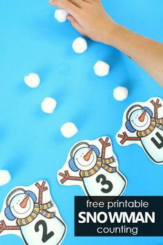 the snowman counting game is shown with hands on it and white balls in the background