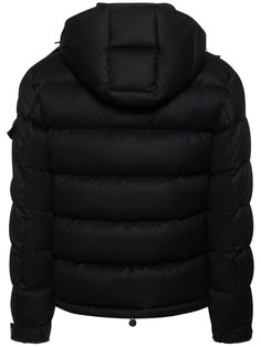 Detachable hood. Front zip closure. Logo details. Two side pockets. One sleeve pocket. Down feather filling. Model is wearing a size2 Luxury Hooded Puffer Jacket With Zipper Closure, Luxury Down Outerwear With Double-lined Hood, Hooded Down Parka With Padded Collar, Luxury Hooded Puffer Jacket With Double-lined Hood, Luxury Down Outerwear With Pockets, Luxury Hooded Outerwear For Outdoor, Luxury Duck Down Outerwear With Detachable Hood, Luxury Hooded Outerwear With Drawstring, Luxury Zipper Closure Outerwear For Outdoor