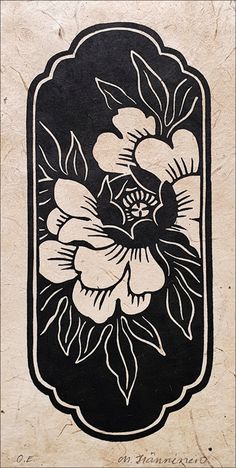 a black and white drawing of flowers on a piece of paper