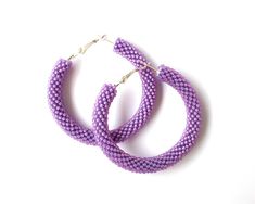 These purple beaded hoop earrings can be your favorite accessory for any occasion. Beadwork earrings are made from purple Japanese seed beads the technique of crocheting. Size: The diameter is 2 inches (5cm) Please see more beaded hoop earrings here: https://etsy.me/2zuRF0t   *NOTE: Colors may look a little different depending on your monitor settings.  *СARE INSTRUCTIONS:  - Keep your handmade jewelry in a closed box or a packaging bag far away from sun rays  - Use perfume before you dress  - Avoid contact with water and any other liquid. Do not wash  - Do not give them to small children  - Do not throw  - Carefully use Shipping cost includes a tracking number. Please remember that delivery times can be affected by various factors, so please treat this with understanding and patience. Buy Beadwork Earrings, Purple Beaded, Packaging Bag, Hannah Montana, Beaded Hoop Earrings, Beaded Hoops, Seed Bead Earrings, Bead Earrings, Jewelry Earrings Hoops