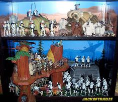 star wars figurines are displayed in a display case