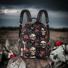 "Wild Roses and Skull Goth backpack, Dark Cottagecore gothic day pack vegan leather laptop carrier padded school back pack, bag organizer * School backpack made of PU printing material * 1 Main compartment for books ,laptop and iPad ,etc. * Metal zipper clouser and 2 side with zipper pockets * Adjustable slide shoulder straps buckles with inner pocket * Casual style for boys' girls to travel, school, vacation, etc. Capture the perfect blend of style and functionality with our School Backpack mad Gothic Standard Backpack For Travel, Gothic Style Standard Backpack For Travel, Gothic Halloween Backpack, Gothic School Backpack, Gothic School Bag With Zipper Closure, Gothic Style School Backpack, Gothic Standard Backpack For School, Gothic Standard Backpack For Everyday Use, Punk Style Backpack For Everyday Use