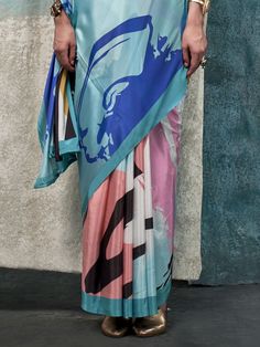 Step into a world of vibrant elegance with our multi-color crepe saree, adorned with exquisite digital print work. This stunning saree, measuring 5.50 meters, is paired with an unstitched sky-blue crepe blouse material, featuring complementary printed work. Perfect for any celebration, be it a festive party, a family gathering, or a formal occasion, this saree ensures you make a striking statement with its dynamic and sophisticated design.
The multi-color crepe fabric of the saree showcases a ha Unstitched Silk Saree With Digital Print, Bollywood Style Blue Dupatta With Digital Print, Bollywood Style Blue Digital Print Dupatta, Blue Silk Dupatta With Digital Print, Traditional Summer Saree With Digital Print, Multicolor Saree For Summer With Traditional Drape, Multicolor Blouse Piece With Printed Motifs For Summer, Multicolor Traditional Drape Saree For Summer, Multicolor Traditional Saree For Summer