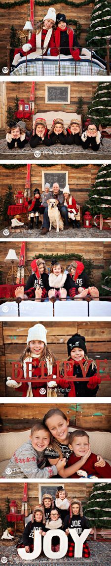 two women are sitting in front of a christmas tree