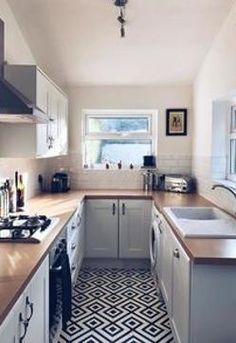 the kitchen is clean and ready for us to use in its new owner's home