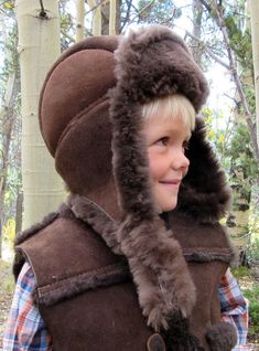 "COLOR PICTURED: (Sahara) To view all the colors available visit our website: www.thesheepherder.com Select Design Studio/Colors and Options/Sheepskin This kid's bomber hat is styled as a replica to match Mom or Dad's hat. It has the same sheepskin strap with Velcro that allows you to fold the shearling hat earflaps up or down and keeps your chin warm in addition. Your child will be the hit of any outing as well as the warmest in the crowd when they are wearing this adorable sheepskin hat! It ma Adjustable Winter Adventure Hat, Brown Hats With Ear Flaps For Outdoors, Brown Hats With Ear Flaps For Outdoor Activities, Balance Bicycle, Matching Mom, Sheepskin Slippers, Kids Slippers, Warm Hug, Deer Skin