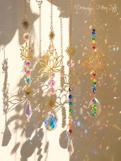 the sun shines brightly through several dangling jewels