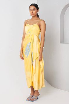 Yellow draped dress printed with abstract patterns and ruched yoke. - Aza Fashions Summer Draped Midi Dress With Fitted Bodice, Yellow Sleeveless Ruched Midi Dress, Yellow Ruched Sleeveless Midi Dress, Pre-draped Sleeveless Ruched Midi Dress, Pre-draped Sleeveless Midi Dress With Ruched Bodice, Yellow Draped Summer Dress, Summer Draped Midi Dress With Pleated Bodice, Summer Midi Dress With Pleated Bodice And Draped Shape, Yellow Ruched Dress With Spaghetti Straps