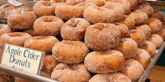 an assortment of apple cider donuts for sale