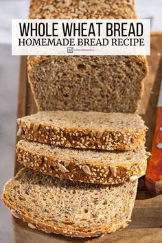 whole wheat bread with sesame seeds on top and text overlay that reads whole wheat bread homemade bread recipe