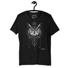 🦉 KAMIOJI's Owl & Witchy T-Shirt: Dark Cottagecore Meets Gothic Charm 🌙 KAMIOJI's Owl shirt brings a mystical blend of witchy vibes and Nordic art, designed for those who love the creepy cute aesthetic. With celestial geometric elements and a touch of dark academia, this graphic tee stands out in any gothic or alt clothing wardrobe. Perfect for embracing the dark aesthetic or adding a hint of dark cottagecore to your look, this witchy T-shirt pairs well with any alternative clothing. Step into Cottagecore T Shirt, Clothes Alt, Creepy Cute Aesthetic, Clothing Wardrobe, Alt Clothing, Art Tshirt, Owl Shirt, Geometric Elements, Nordic Art