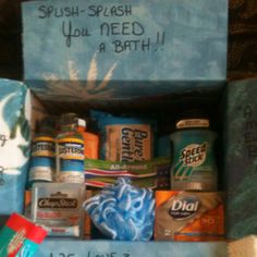 an open box filled with lots of different types of toiletries and handwritten message