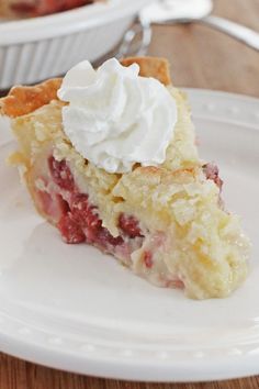 a slice of pie with whipped cream on top