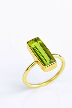 Celebrate August with this beautiful Peridot Quartz gemstone bar ring. One of Danique Jewelry's signature designs that incorporates clean lines with colorful gemstones. Ring is 925 sterling silver and plated with 18k yellow gold. #peridot #green #august #birthdaygift #gemstone Birthday Gemstones, August Birthstone Ring, Ring Baguette, August Birthday, Vertical Bar, Bar Ring, Bridal Parties, August Birthstone, Geometric Ring