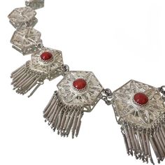 Exquisite delicate vintage filigree necklace in bright silver-tone metal with round red cabochons (stone or glass) circa 1970s  Length: 38.5 cm / 15.1 '' Width: up to 3.8 cm / 1.5 '' Weight: 31.7 grams Beautiful vintage condition, with some minor patina Shipping will be charged only once when ordering multiple items from my shop More quality vintage items in my Etsy shop: https://www.etsy.com/shop/styled64 Festive Silver Filigree Necklaces, Elegant Filigree Necklaces For Festivals, Elegant Festival Filigree Necklaces, Vintage Adjustable Filigree Necklace, Adjustable Vintage Filigree Necklace, Adjustable Vintage Filigree Necklaces, Formal Red Necklaces With Intricate Design, Formal Red Necklace With Intricate Design, Ornate Filigree Necklaces For Festivals