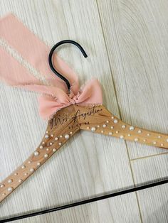 Our pearl hangers are elegant and stylish- made for displaying your wedding attire in style. Hangers are handcrafted to ensure that each piece is unique in its own way! Our hangers are laser engraved. Leaving the personalized name a dark brown color. With adhesive pearls added to create the elegant appearance. Pearls are completely optional to you! Our hangers are just as eye catching without the touch of pearls! We offer a few styles of elegant fonts for you to choose from, please view the last Pearl Hangers, Bridal Gown Hanger, Pearl Hanger, Bridesmaid Hanger, Wedding Dress Hangers, Hanger Wedding, Wedding Titles, Bridesmaid Hangers, Wedding Dress Hanger