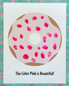 a donut with pink sprinkles on it and the words the color pink is beautiful