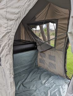 the inside of a tent with its door open