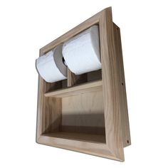 two rolls of toilet paper in a wooden holder