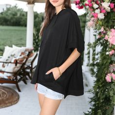 Elevate your athletic wear with the Anna-Kaci Boyfriend Short-Sleeve Hoodie. Designed with drop shoulder short sleeves and crafted from soft terry knit fabric, this hoodie offers a feminine twist on a classic athletic style, perfect for layering over tees and long sleeve shirts during your workouts. Black Sporty Tops With Pockets, Sporty Black Tops With Pockets, Hooded Top For Summer Loungewear, Summer Hooded Loungewear Tops, Black Tops For Spring Loungewear, Fall Athleisure Tops With Short Sleeves, Hooded Summer Top With Pockets, Summer Hooded Tops With Pockets, Casual Drop Shoulder Tops With Pockets