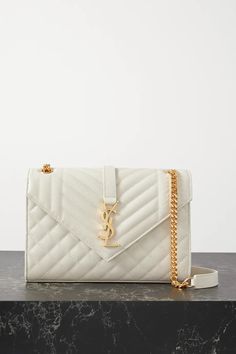 Off-white Envelope medium quilted textured-leather shoulder bag | SAINT LAURENT | NET-A-PORTER Ysl Envelope Bag Medium, Ysl Envelope Bag, Ysl Envelope, Saint Laurent Shirt, Saint Laurent Jeans, Luxury Gifts For Her, Envelope Bag, Leather Bucket Bag, Saint Laurent Bag