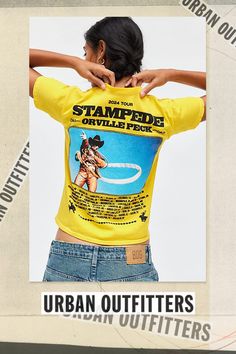 Baby tee in a slim & cropped fit featuring Orville Peck Stampede tour graphics across the front & back. Designed with a crew neckline and cap sleeves with western-inspired graphics for a country vibe. Only at Urban Outfitters. Features Orville Peck Stampede Tour graphic baby tee Fitted graphic tee Soft & stretchy cotton knit Crew neckline and short sleeves Stampeding horses graphic across the chest Orville Peck tour graphics across the back Shrunken, slim fit Cropped length Easy pull-over style UO exclusive Content + Care 100% Cotton Machine wash Imported Size + Fit Model in Yellow is 5’8" and wearing size Medium Measurements taken from size Medium Chest: 30" Length: 19" | Orville Peck Stampede Tour Graphic Baby Tee in Yellow, Women's at Urban Outfitters Summer Band Merch Cropped T-shirt With Graphic Print, Summer Band Merch Cropped T-shirt With Crew Neck, Band Merch Cropped T-shirt For Summer, Summer Band Merch Cropped T-shirt, Summer Band Merch Cropped T-shirt With Short Sleeves, Summer Crew Neck Top With Back Print, Urban Outfitters Text Print Top For Summer, Urban Outfitters Summer Top With Text Print, Retro Letter Print Tops By Urban Outfitters