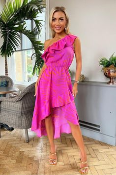 This hot pink printed midi dress from AX Paris is the perfect evening dress for the season! Features a one shoulder frill top, an elasticated waist, and a high-low skirt with frill detail making this dress super flattering. Team it with heels and a clutch to complete the look. Frill Dress Ruffles, Paris Pink, Dress Ruffles, Frill Top, Frill Tops, Playsuit Dress, 21st Dresses, Ruffle Midi Dress, Frill Dress