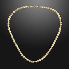 Step into a new era of sophistication with our highly anticipated 5mm Pearl Rondelle Necklace showcasing a full string of genuine ivory pearls with gold detailing. Wear this men’s pearl chain with a matching pearl bracelet for a style that’s hitting top of the charts currently with celebrities and professional athletes. Our Men's Pearls Collection, features sophisticated fresh water pearl necklaces and bracelets, designed especially for men. Drawing inspiration from historical royalty who layere Pearl Chain For Men, Cream Pearl Chain Jewelry With Round Beads, Classic Cream Pearl Jewelry, Classic Cream Necklace With Pearl Chain, Classic Cream Pearl Necklace With Pearl Charm, Classic Cream Pearl Chain Necklace, Man Pearl Necklace, Men In Pearl Necklace, Guys Necklaces Pearl