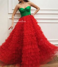 Details - Green and red color  - Designer tulle fabric  - Handmade corset  - Ball gown style with waist definition - For special occasions Corset Ball Gowns, Handmade Corset, Teuta Matoshi, Gown Style, Tulle Fabric, Green And Red, Christmas Dress, Fancy Dresses, Festival Fashion