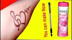 a woman's arm with writing on it and a pen next to the tattoo