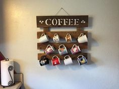 a coffee cup display hanging on the wall